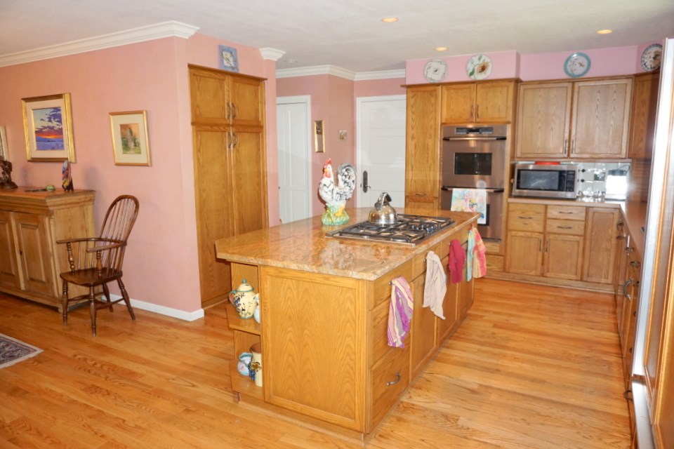 42265 Piburn Flats Road Crawford, CO 81415 - Photo 7 of 35 a kitchen with stainless steel appliances granite countertop a sink stove and refrigerator