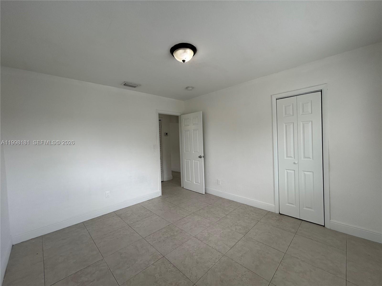 2804 Southwest 35th Avenue, Unit 2804 Miami, FL 33133 - Photo 14 of 22 a view of an empty room