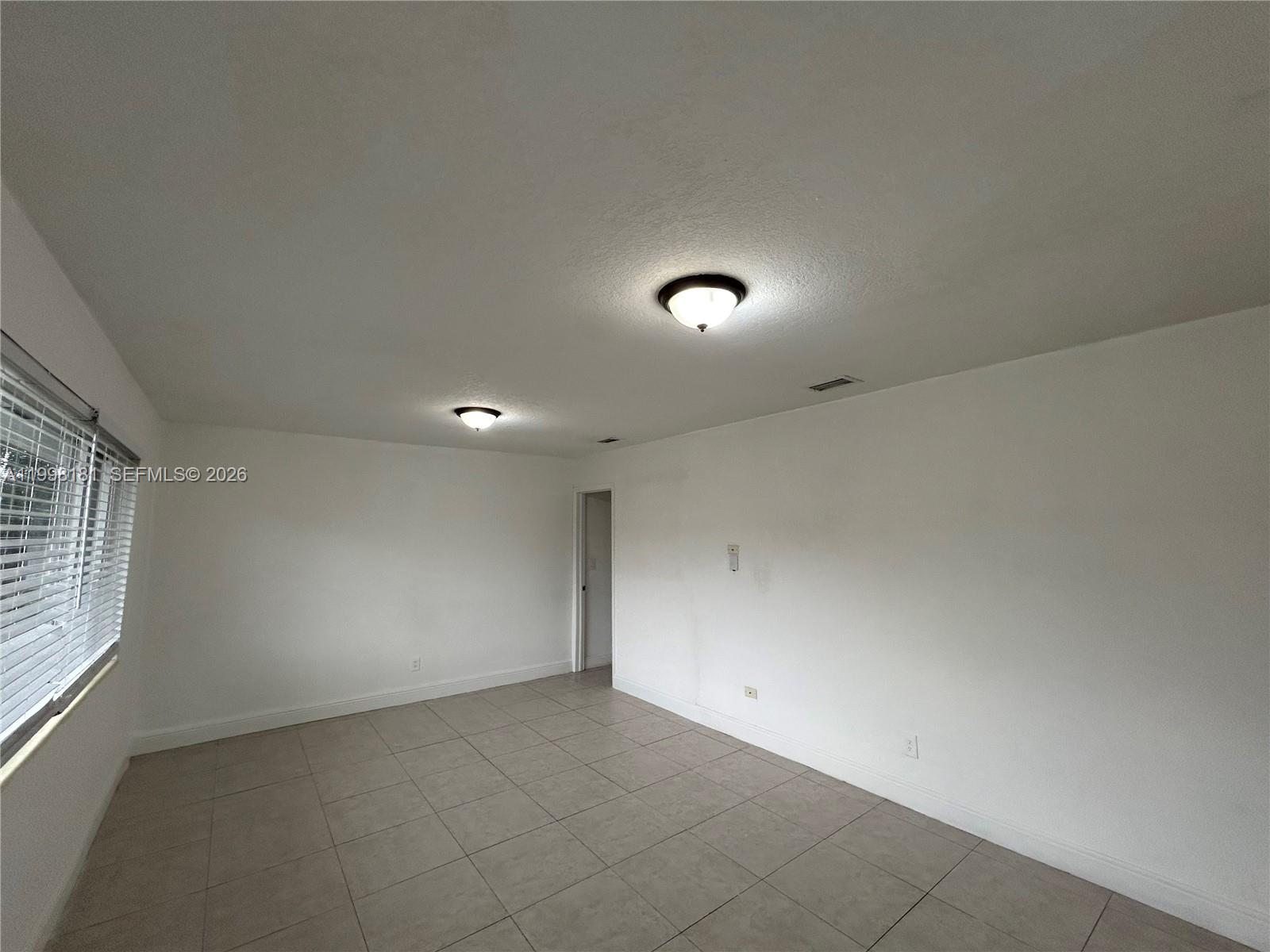 2804 Southwest 35th Avenue, Unit 2804 Miami, FL 33133 - Photo 3 of 22 a view of an empty room