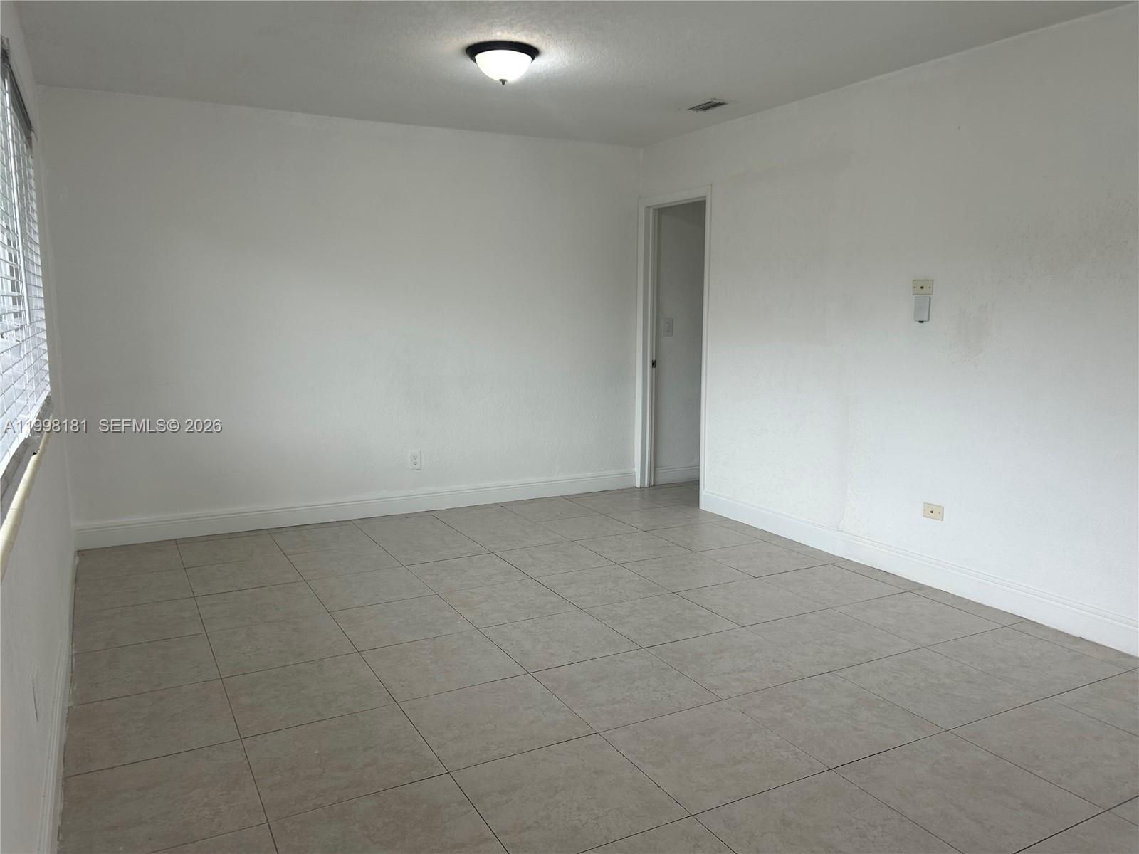 2804 Southwest 35th Avenue, Unit 2804 Miami, FL 33133 - Photo 5 of 22 a view of an empty room