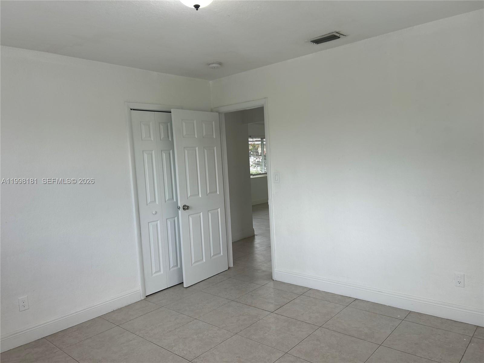 2804 Southwest 35th Avenue, Unit 2804 Miami, FL 33133 - Photo 8 of 22 a view of an empty room