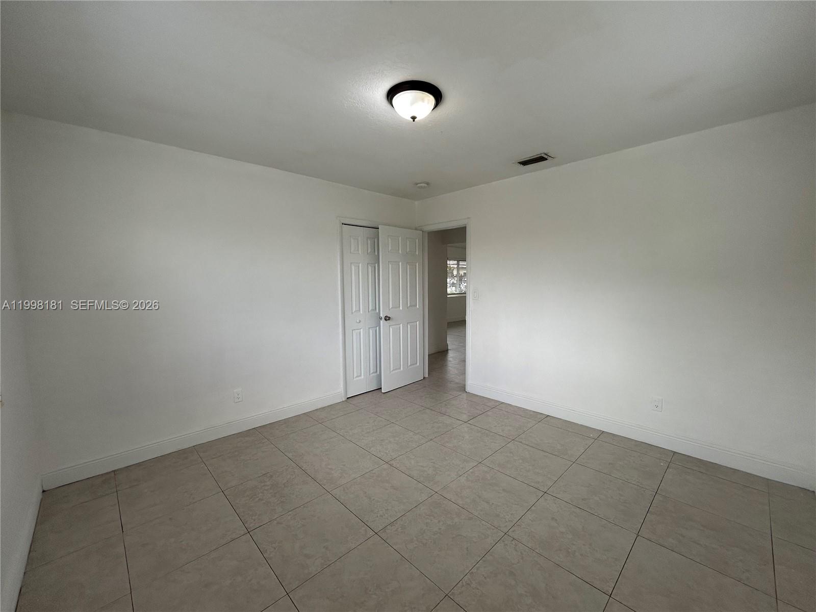 2804 Southwest 35th Avenue, Unit 2804 Miami, FL 33133 - Photo 10 of 22 a view of an empty room