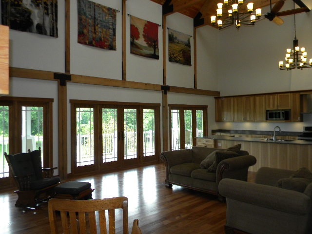 5255 Yale Bridge Road Rockton, IL 61072 - Photo 4 of 25 a living room with furniture and a chandelier