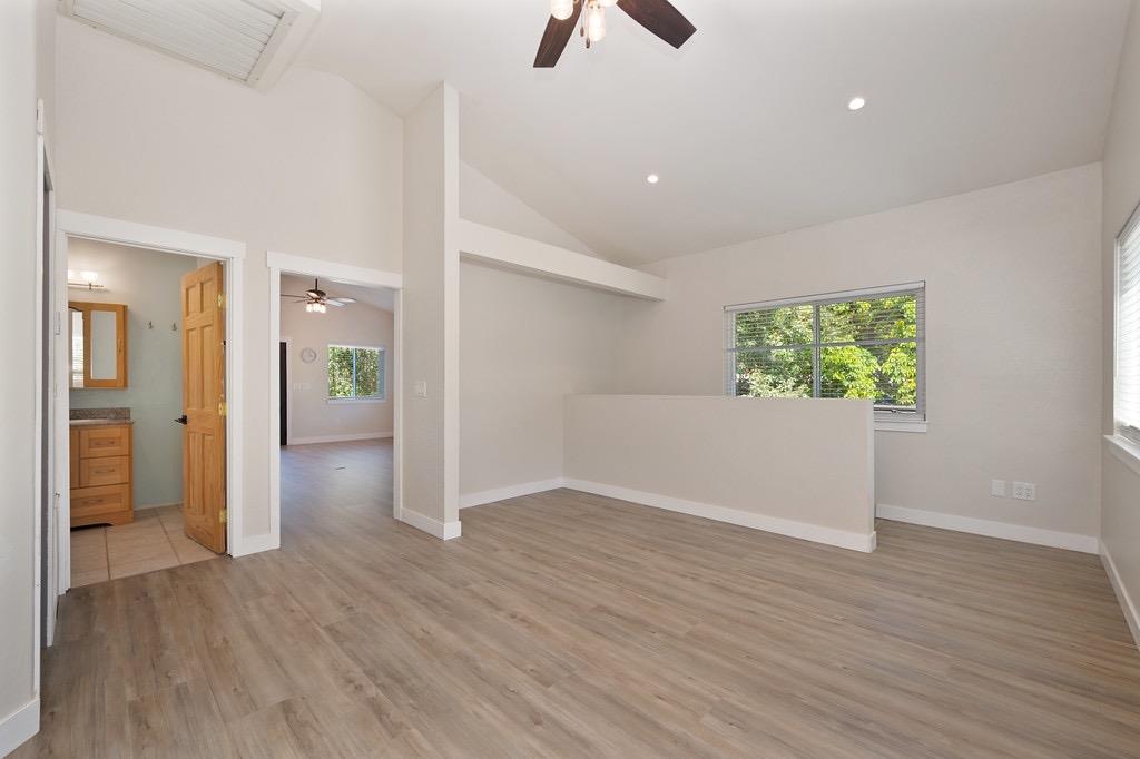 5205 Rooster Lane Somerset, CA 95684 - Photo 35 of 98 wooden floor in an empty room with a window
