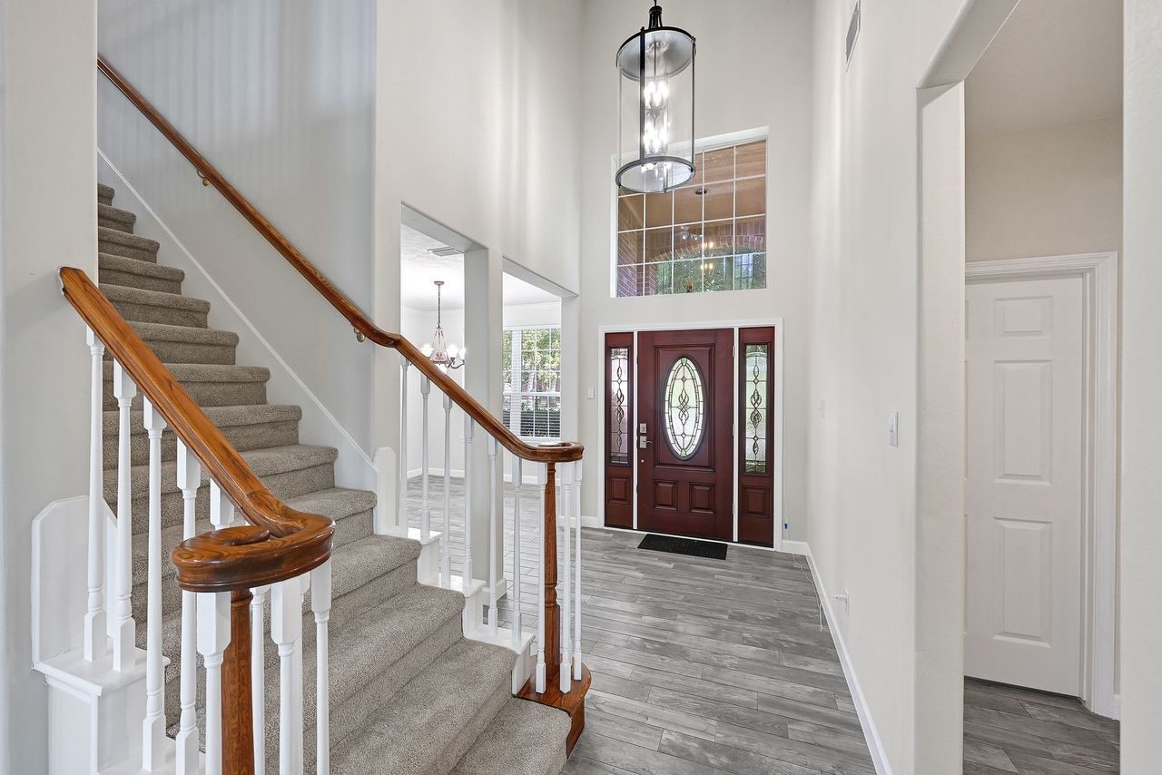19126 South Rim Trail Spring, TX 77388 - Photo 12 of 21 a view of entryway and hall with wooden floor