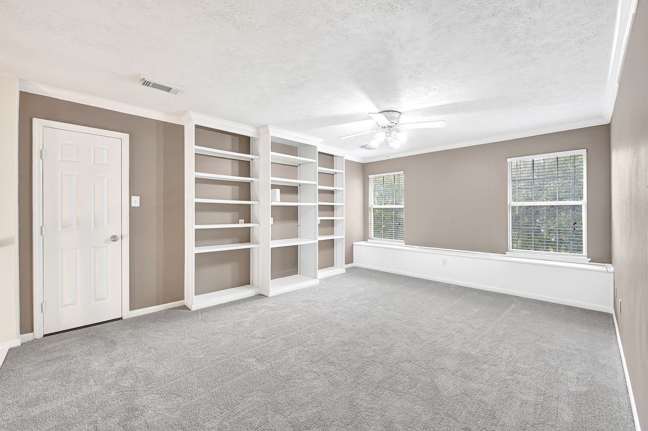 19126 South Rim Trail Spring, TX 77388 - Photo 19 of 21 a view of an empty room with a window
