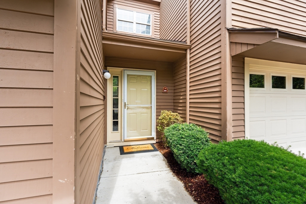 200 Ridgefield Circle, Unit C Clinton, MA 01510 - Photo 21 of 35 a view of a house with a window and wooden door