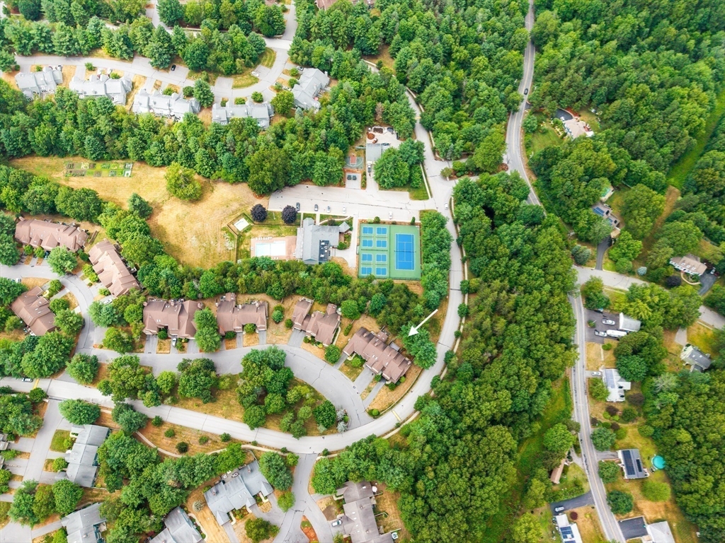 200 Ridgefield Circle, Unit C Clinton, MA 01510 - Photo 25 of 35 an aerial view of residential houses with outdoor space and trees all around