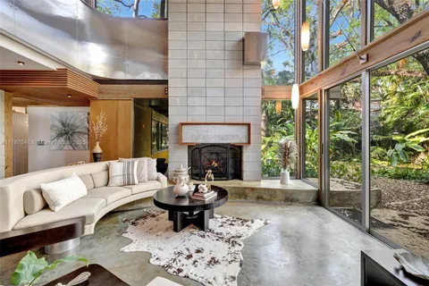 a kitchen with a sink and a refrigerator