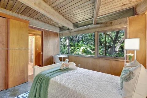 a view of entryway with wooden floor and a potted plant