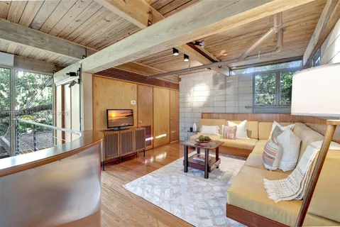 an aerial view of multiple house with yard