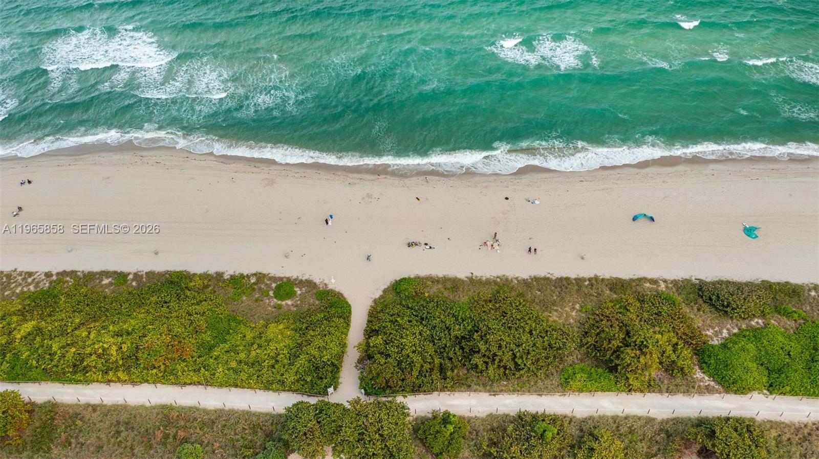 9172 Collins Avenue, Unit 210 Surfside, FL 33154 - Photo 29 of 41 a view of a lake
