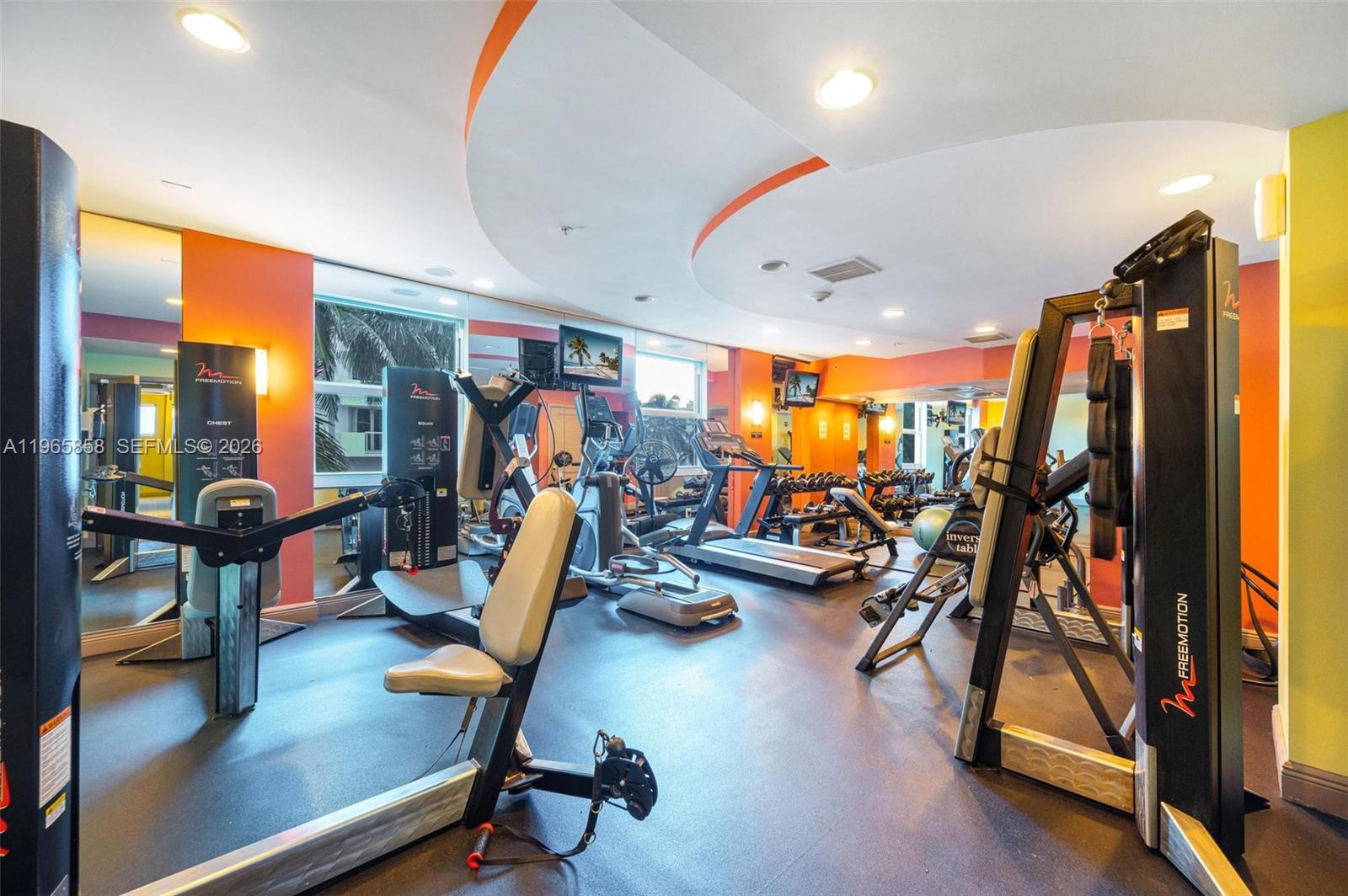 9172 Collins Avenue, Unit 210 Surfside, FL 33154 - Photo 35 of 41 a view of a room with gym equipment