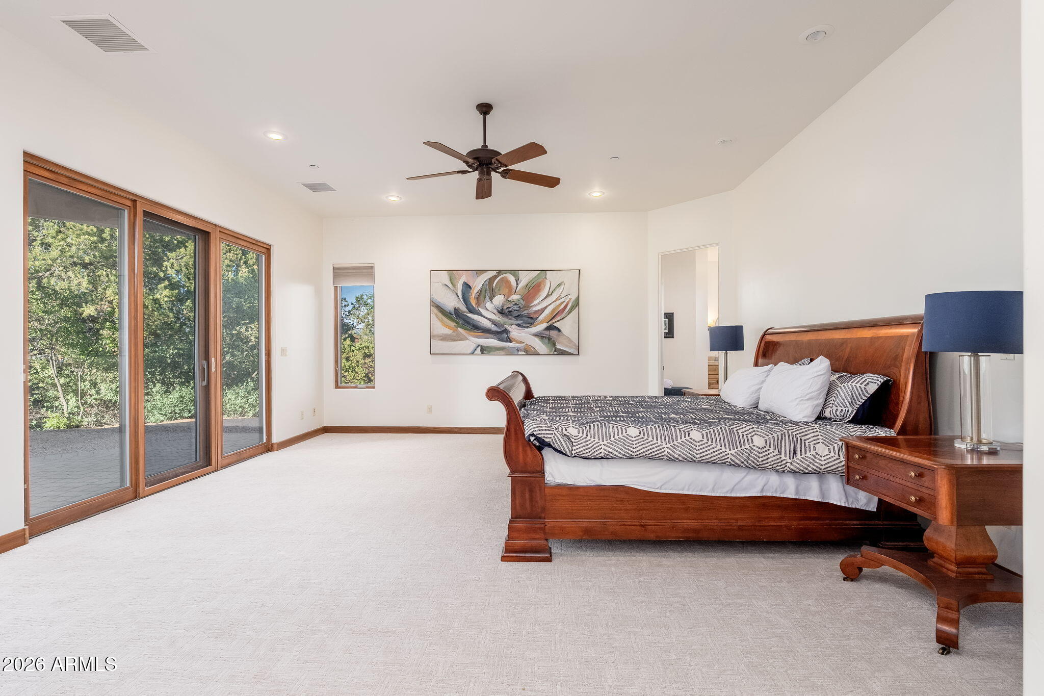 2208 East Filaree Circle Payson, AZ 85541 - Photo 15 of 60 a bedroom with a bed and wooden floor