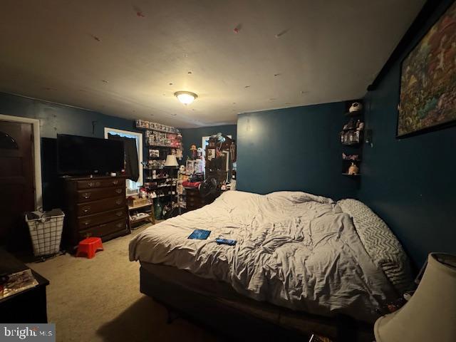 7844 Mentzer Gap Road Waynesboro, PA 17268 - Photo 12 of 23 a bedroom with a bed and a gym equipment