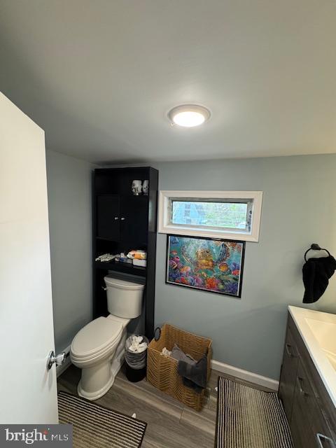 7844 Mentzer Gap Road Waynesboro, PA 17268 - Photo 8 of 23 a bathroom with a toilet a sink and a mirror