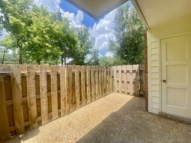 a view of a wooden fence