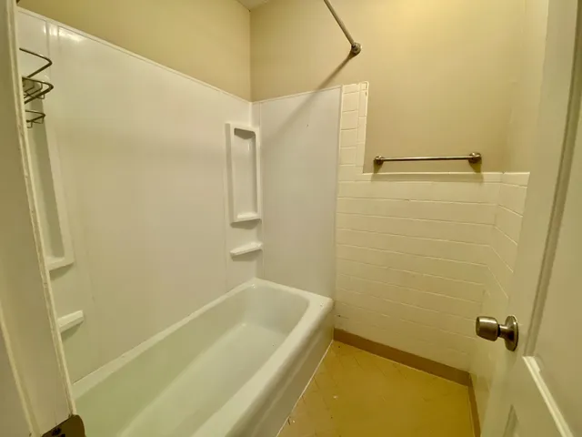 a bathroom with a bathtub