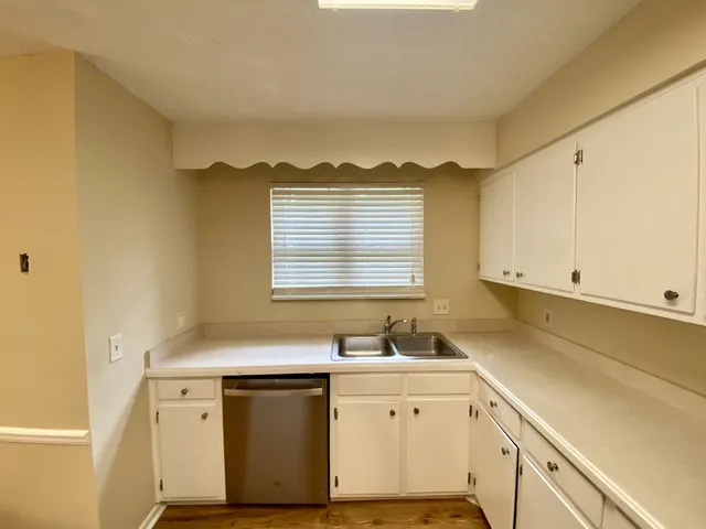 a view of a kitchen with a sink