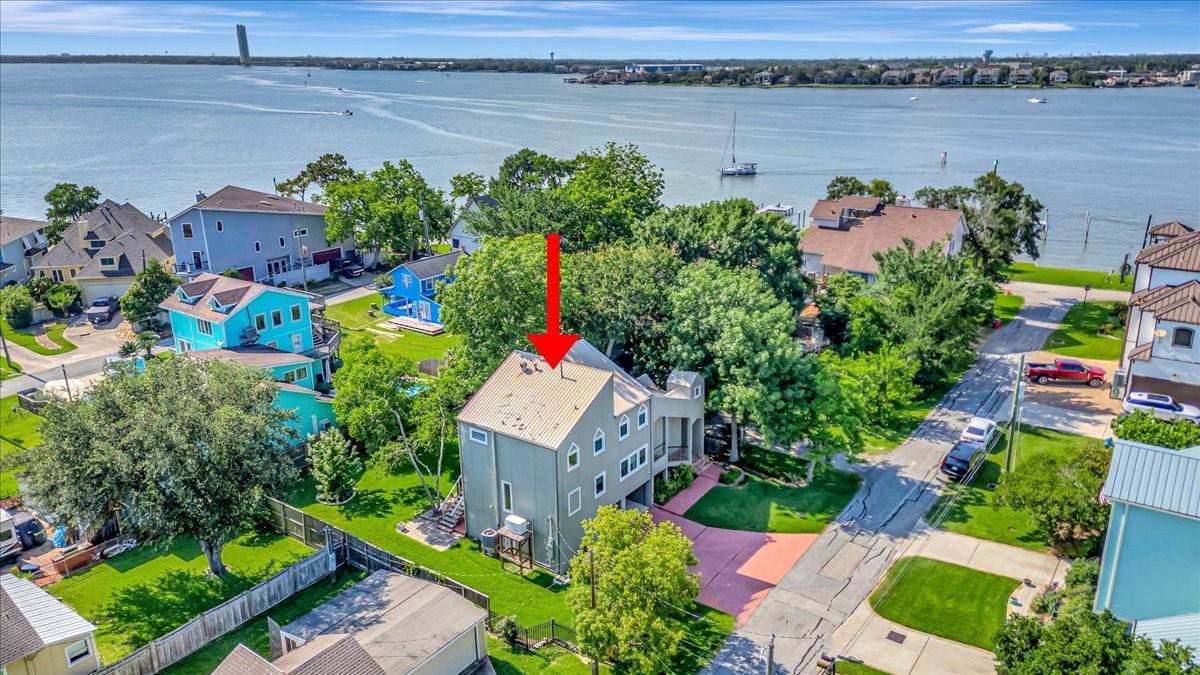 112 Oak Road Clear Lake Shores, TX 77565 - Photo 1 of 41 AERIAL VIEW OF THE EXTRA-LARGE LOT JUST STEPS AWAY FROM CLEAR LAKE, THE BOAT RAMP AND COMMUNITY PIER!
