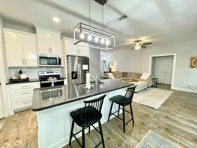 a view of a dining room with furniture