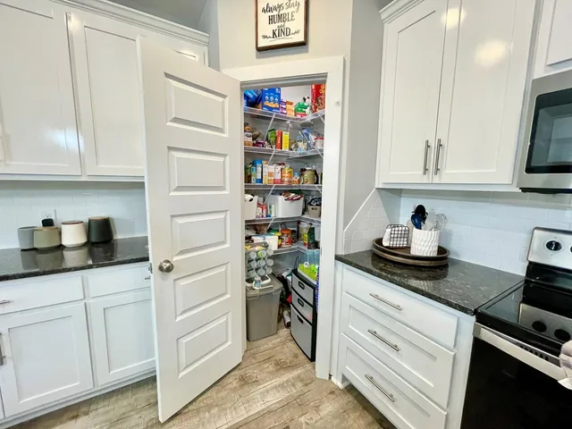 a view of a dining room with furniture