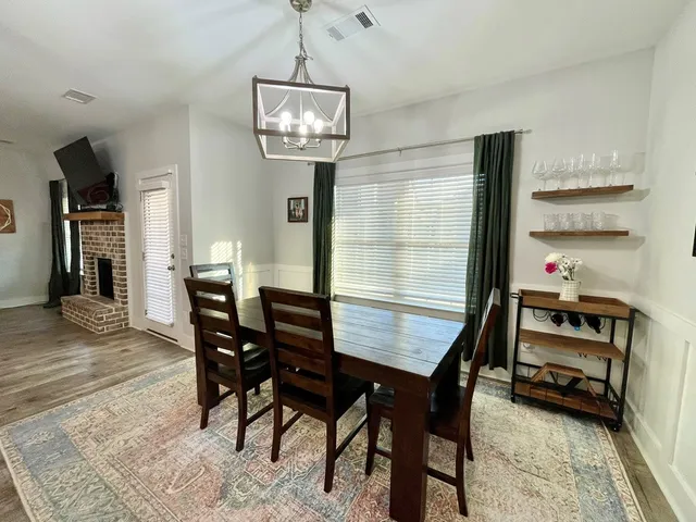 a workspace with furniture and window