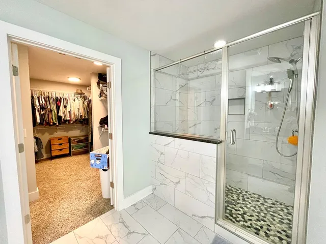 a bathroom with sinks granite countertop and a sink