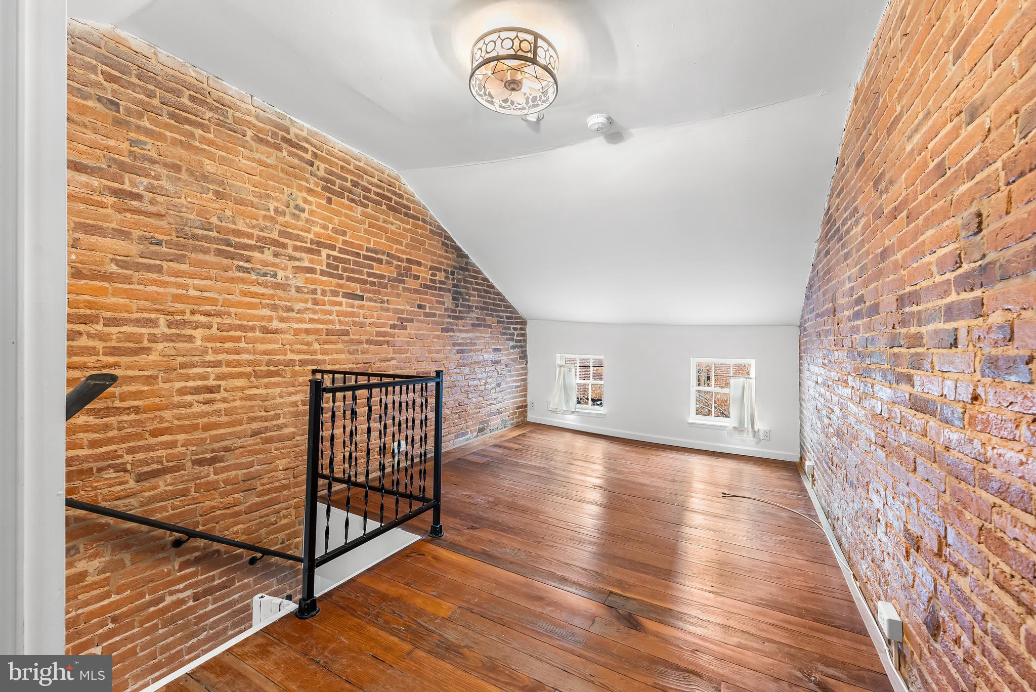 1812 Lancaster Street Baltimore, MD 21231 - Photo 20 of 38 a view of livingroom with wooden floor