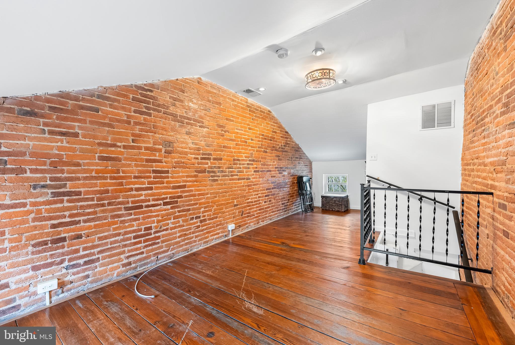 1812 Lancaster Street Baltimore, MD 21231 - Photo 25 of 38 a view of balcony with wooden floor