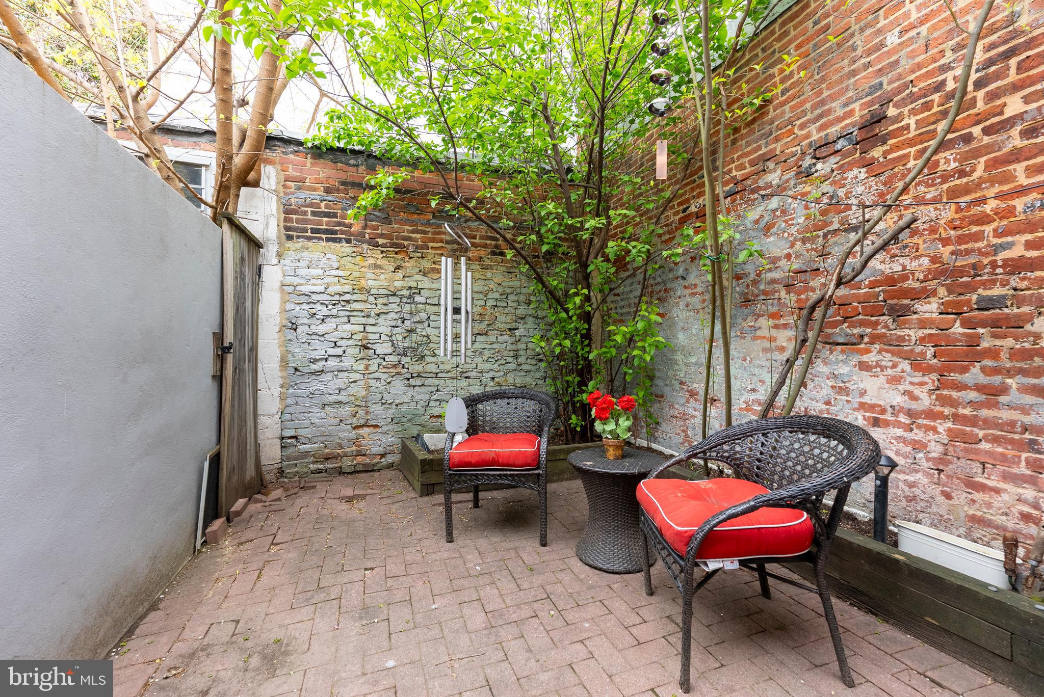1812 Lancaster Street Baltimore, MD 21231 - Photo 27 of 38 a backyard of a house with seating space