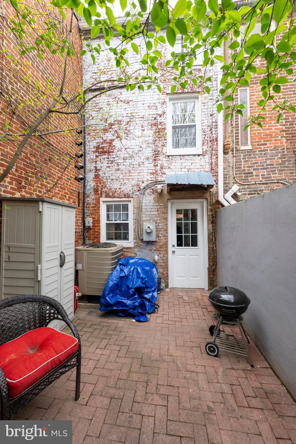 1812 Lancaster Street Baltimore, MD 21231 - Photo 30 of 38 a front view of a house with patio
