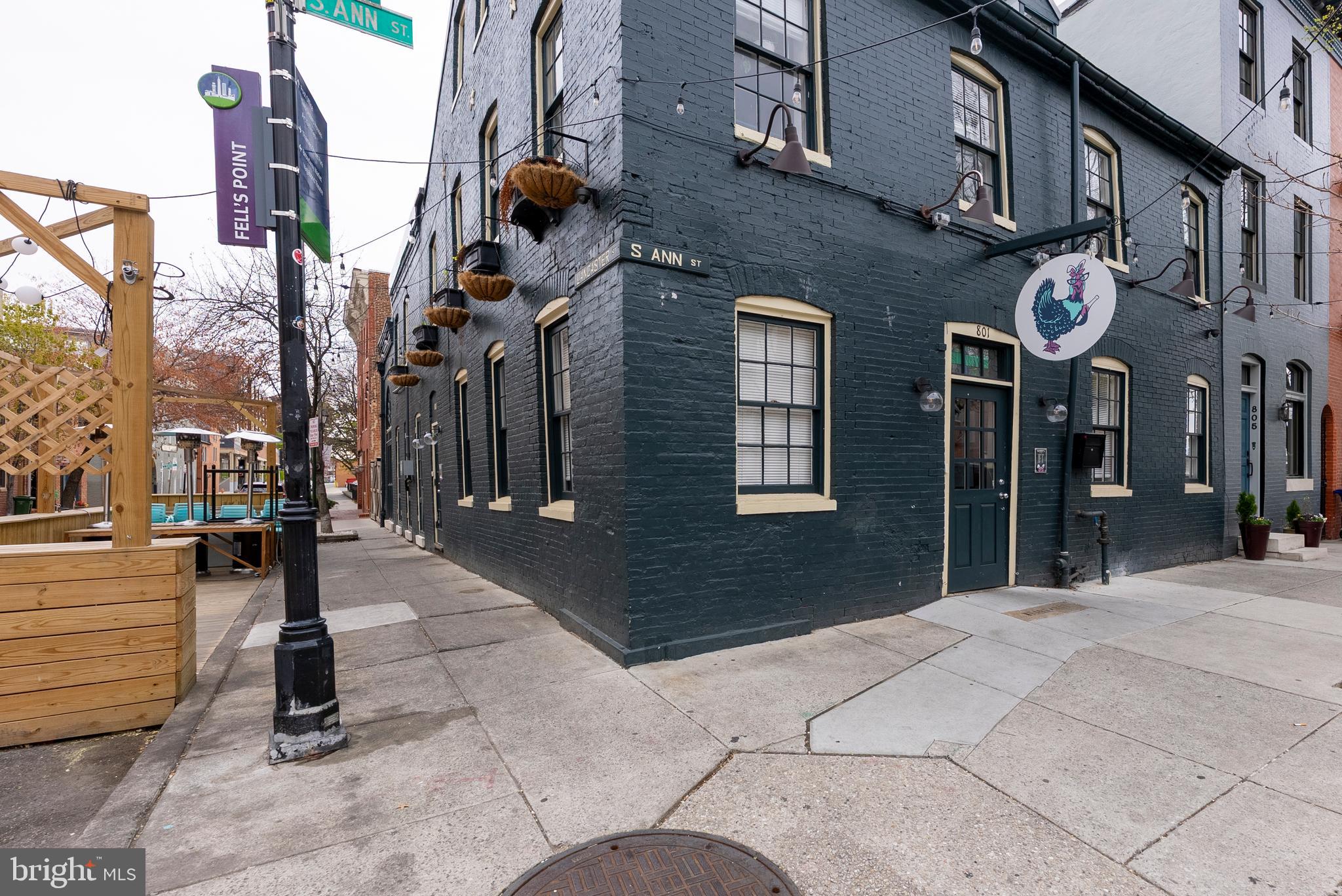 1812 Lancaster Street Baltimore, MD 21231 - Photo 33 of 38 a view of a building with traffic signal lights