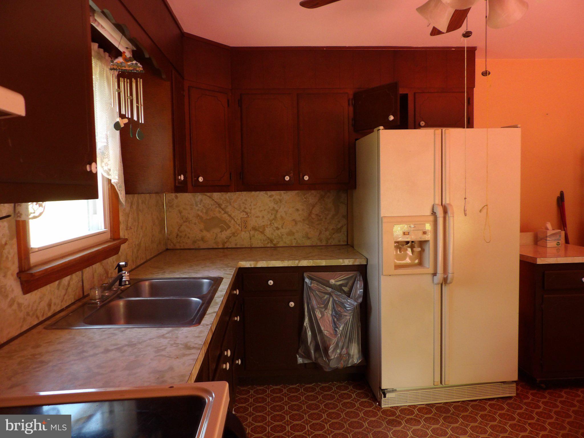 1045 Lockport Road Lewistown, PA 17044 - Photo 8 of 51 Cozy kitchen with warm wood tones.