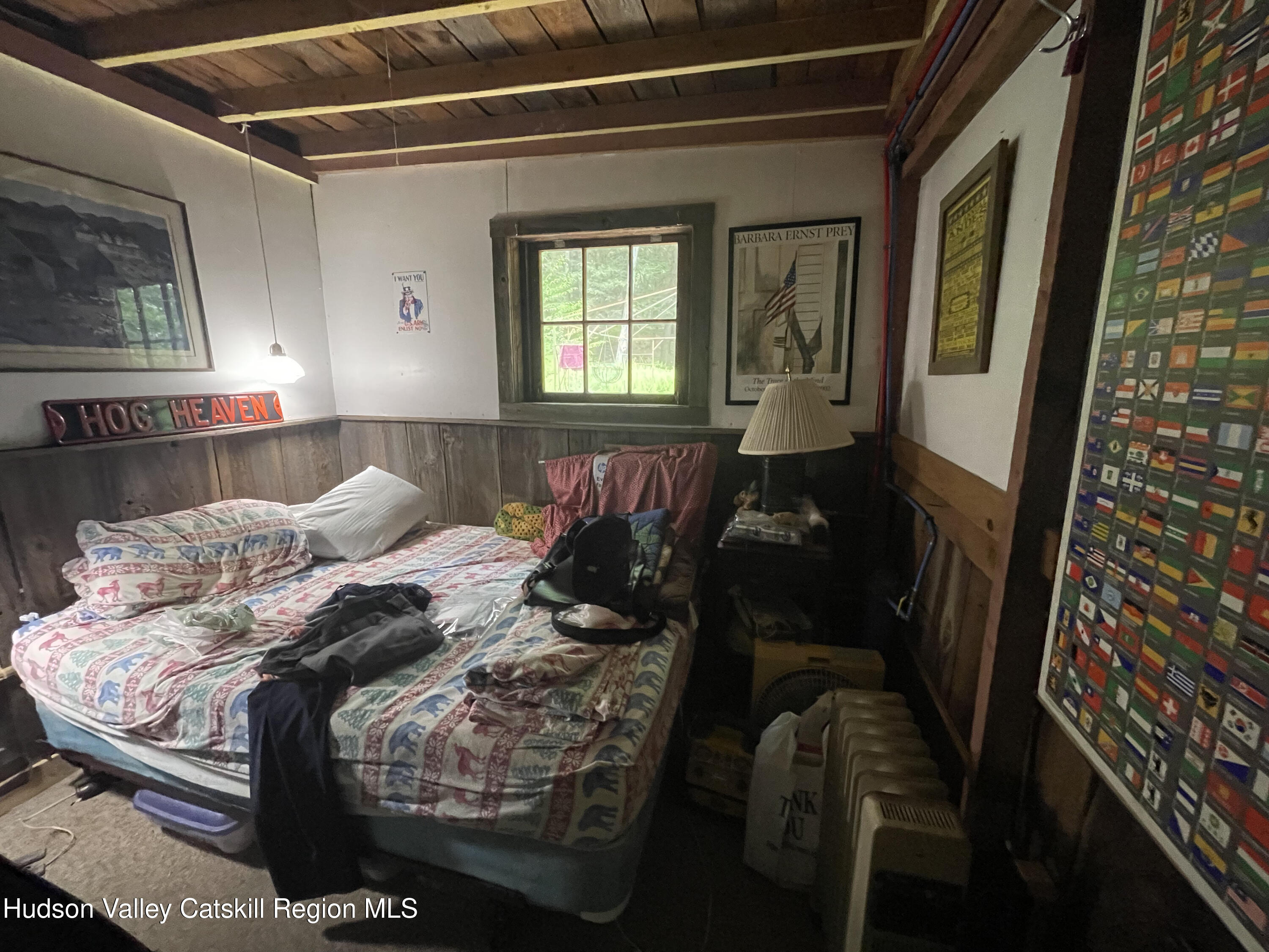 367 Rainbow Hill Road Andes, NY 13731 - Photo 16 of 30 a bed sitting in a bedroom next to a window