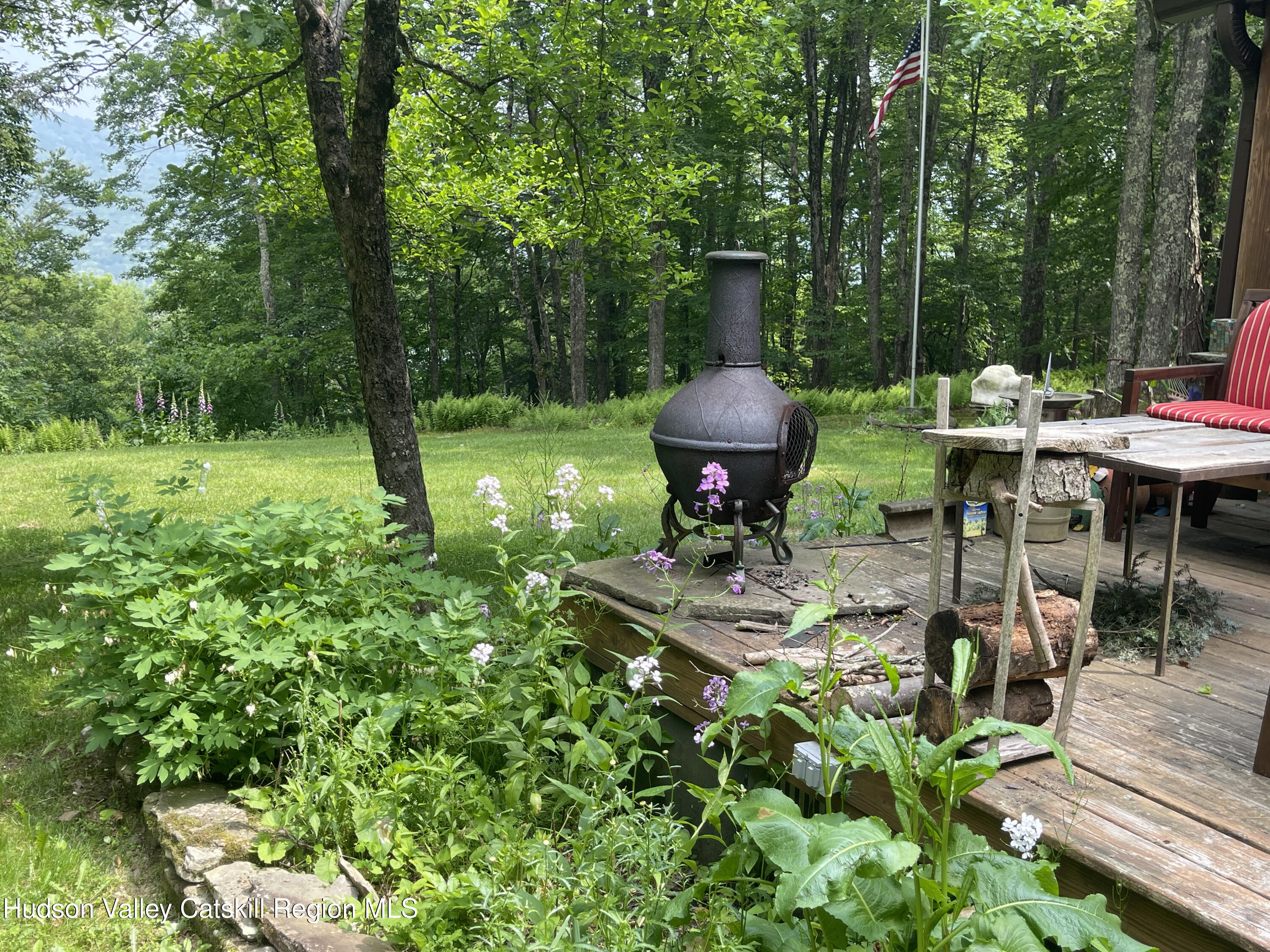 367 Rainbow Hill Road Andes, NY 13731 - Photo 24 of 30 a view of a fire pit in a backyard