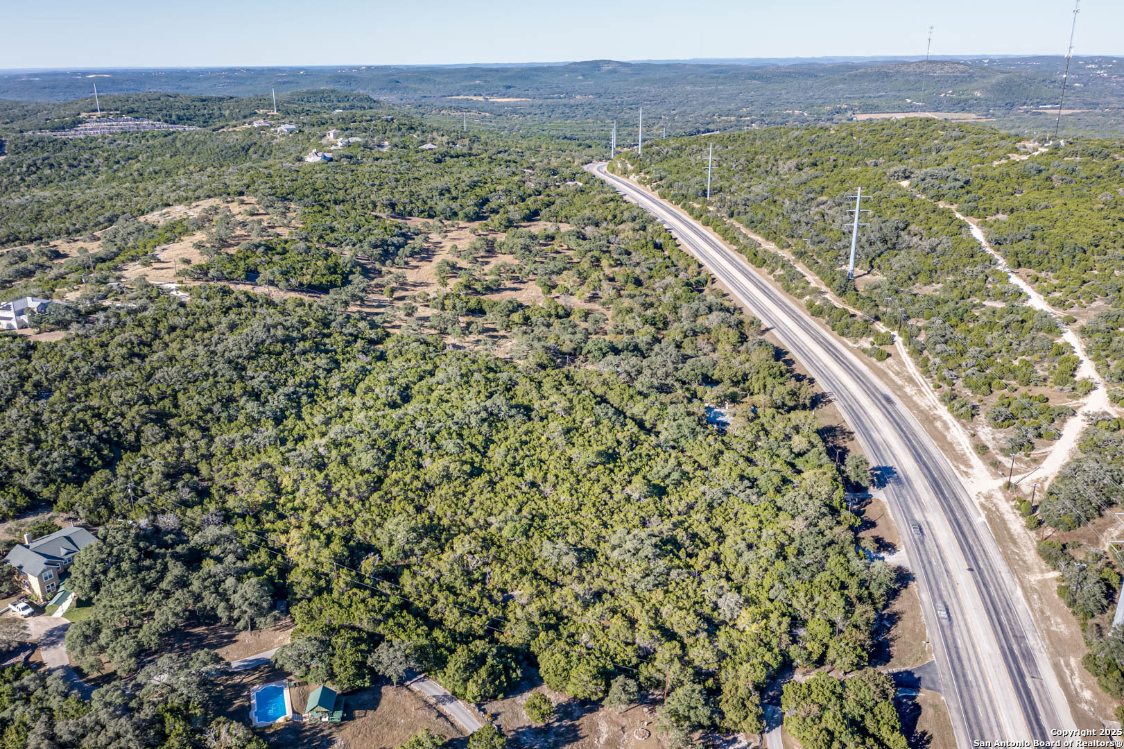 18961 Bandera Road Helotes, TX 78023 - Photo 4 of 5 a view of a city with a mountain