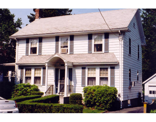 30 Huntington Road Milton, MA 02186 - Photo 1 of 1 a front view of a house with garden