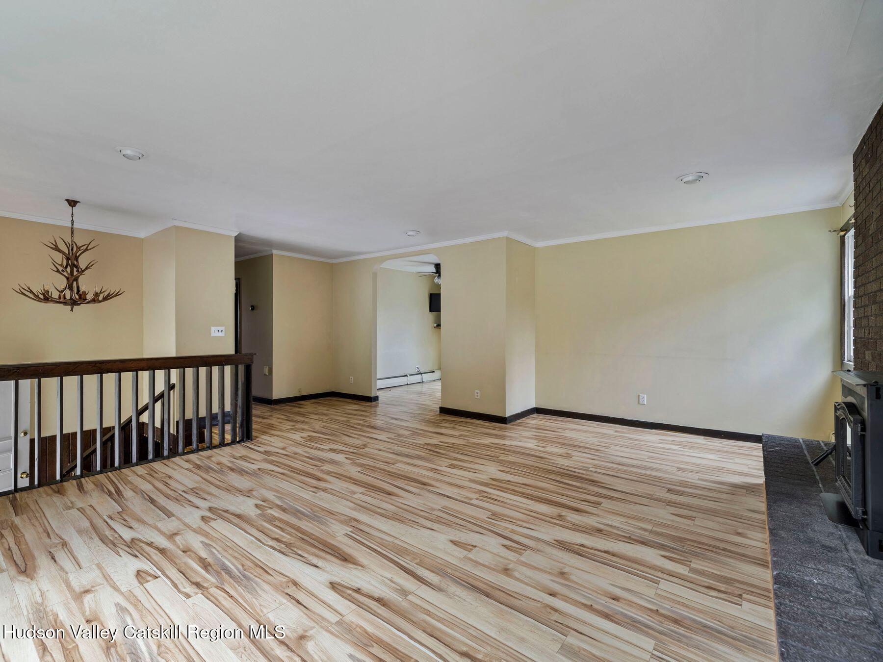 317 Mitchell Hollow Road Windham, NY 12496 - Photo 11 of 41 a view of a livingroom with wooden floor