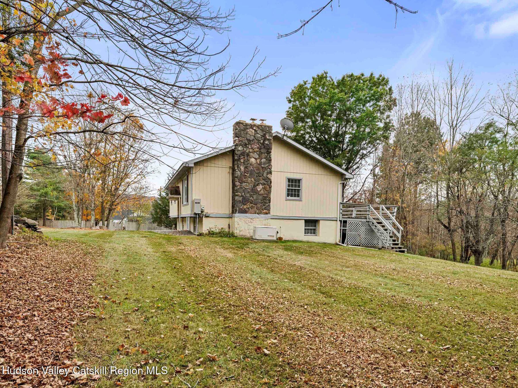317 Mitchell Hollow Road Windham, NY 12496 - Photo 2 of 41 a view of a house with a yard