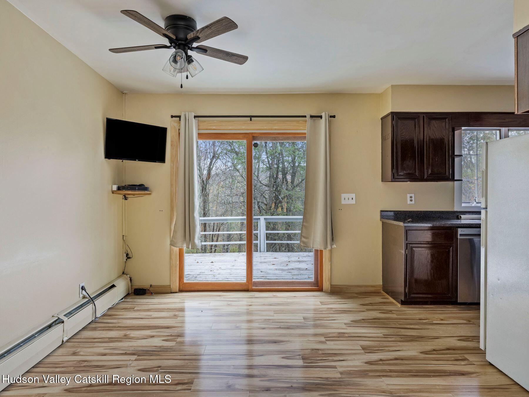 317 Mitchell Hollow Road Windham, NY 12496 - Photo 21 of 41 a view of a kitchen with a sink and a refrigerator