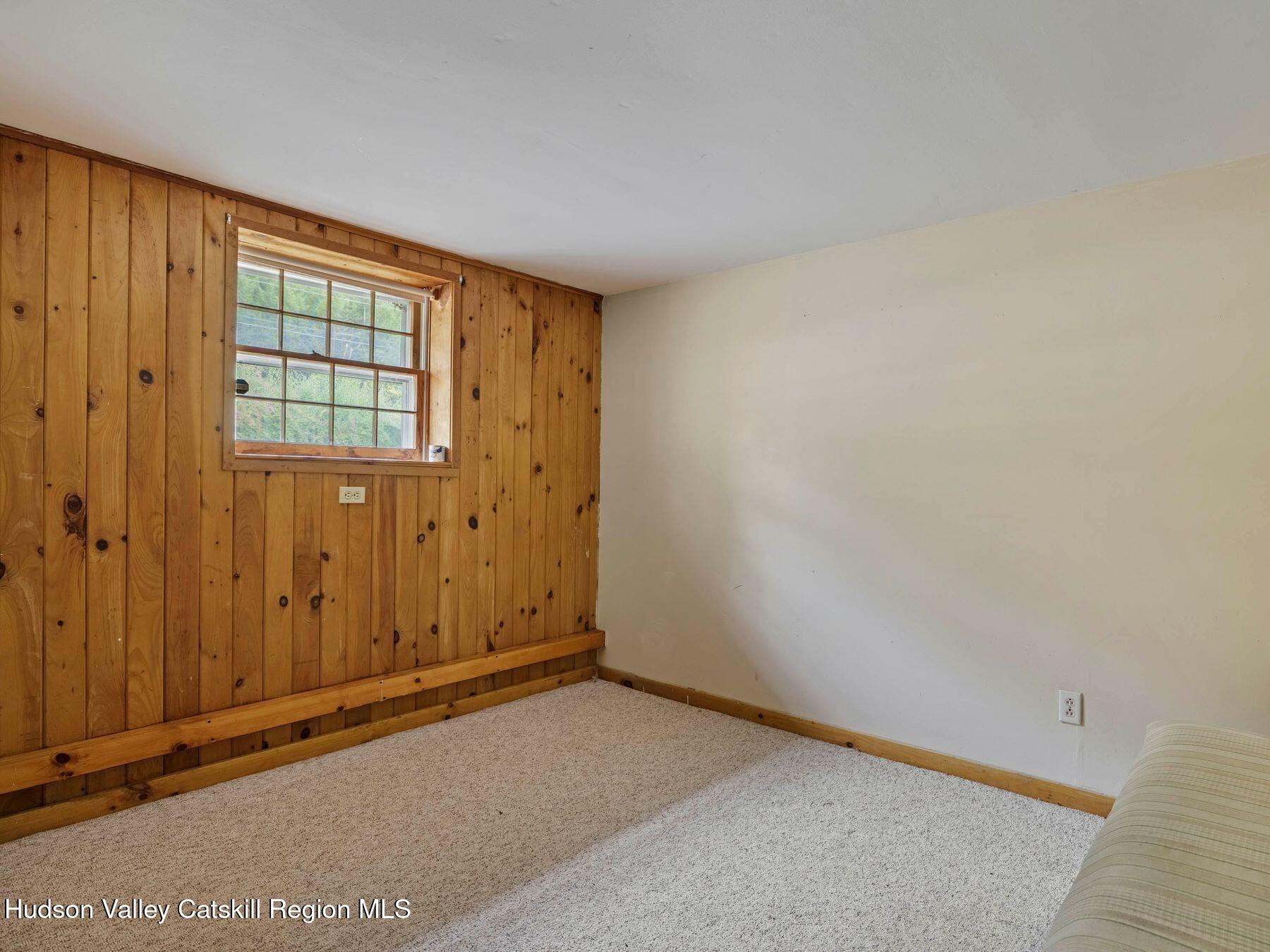 317 Mitchell Hollow Road Windham, NY 12496 - Photo 30 of 41 an empty room with windows