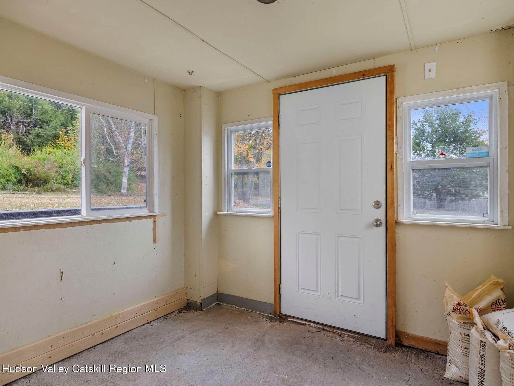 317 Mitchell Hollow Road Windham, NY 12496 - Photo 36 of 41 a view of an empty room with a window