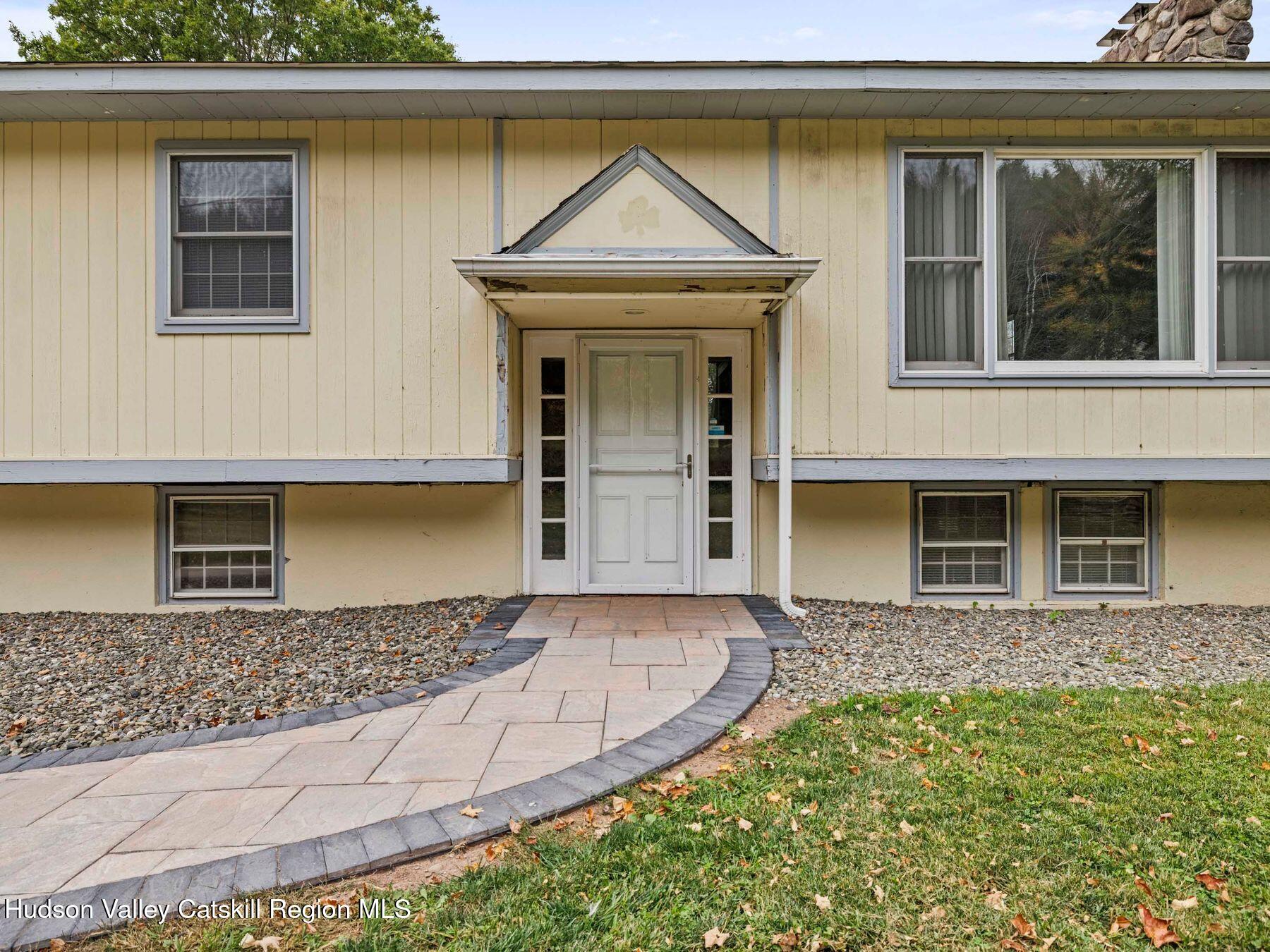 317 Mitchell Hollow Road Windham, NY 12496 - Photo 4 of 41 a front view of a house with garden