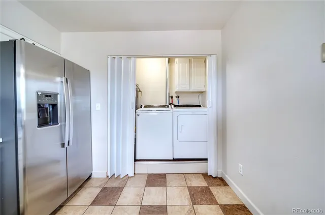 a view of a hallway with a bathroom