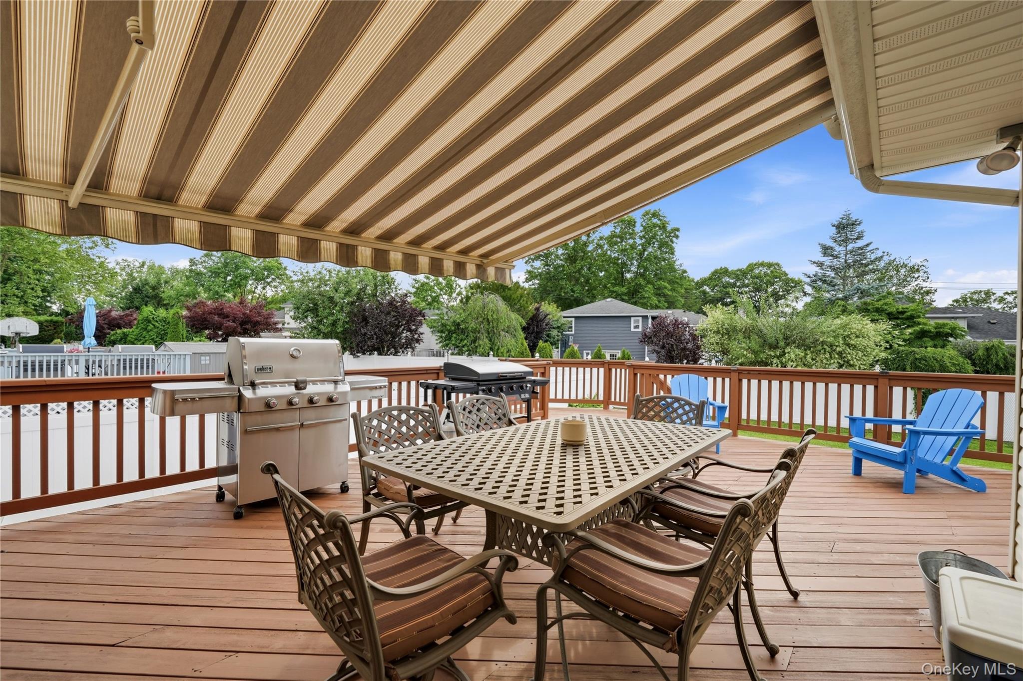 1853 Decatur Avenue Merrick, NY 11566 - Photo 38 of 43 a view of balcony with furniture and wooden deck