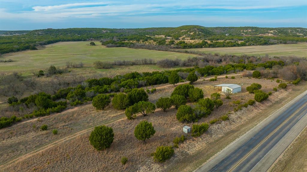 6510 Highway 83 Ovalo, TX 79541 - Photo 14 of 15 an aerial view of residential houses with outdoor space and lake view