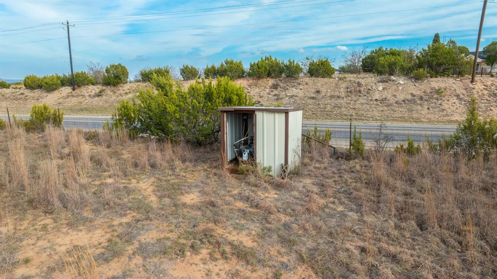 6510 Highway 83 Ovalo, TX 79541 - Photo 7 of 15 a backyard of a house with lots of green space
