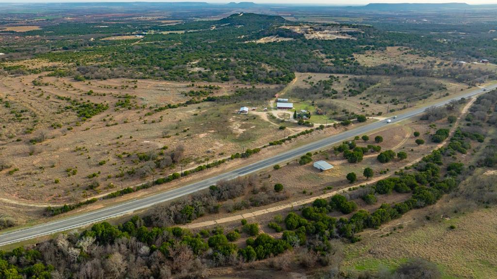 6510 Highway 83 Ovalo, TX 79541 - Photo 10 of 15 a view of a yard with a mountain