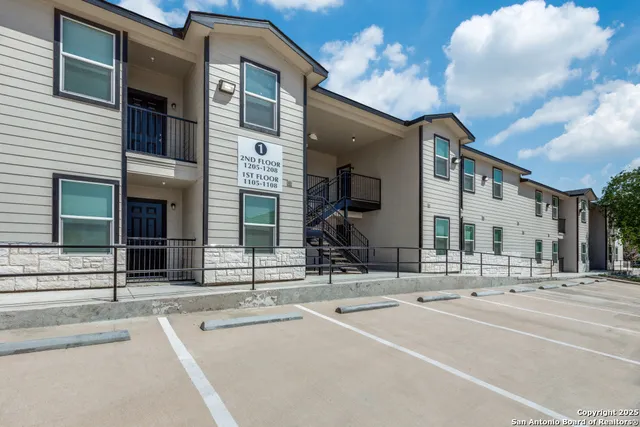a view of a building with a swimming pool